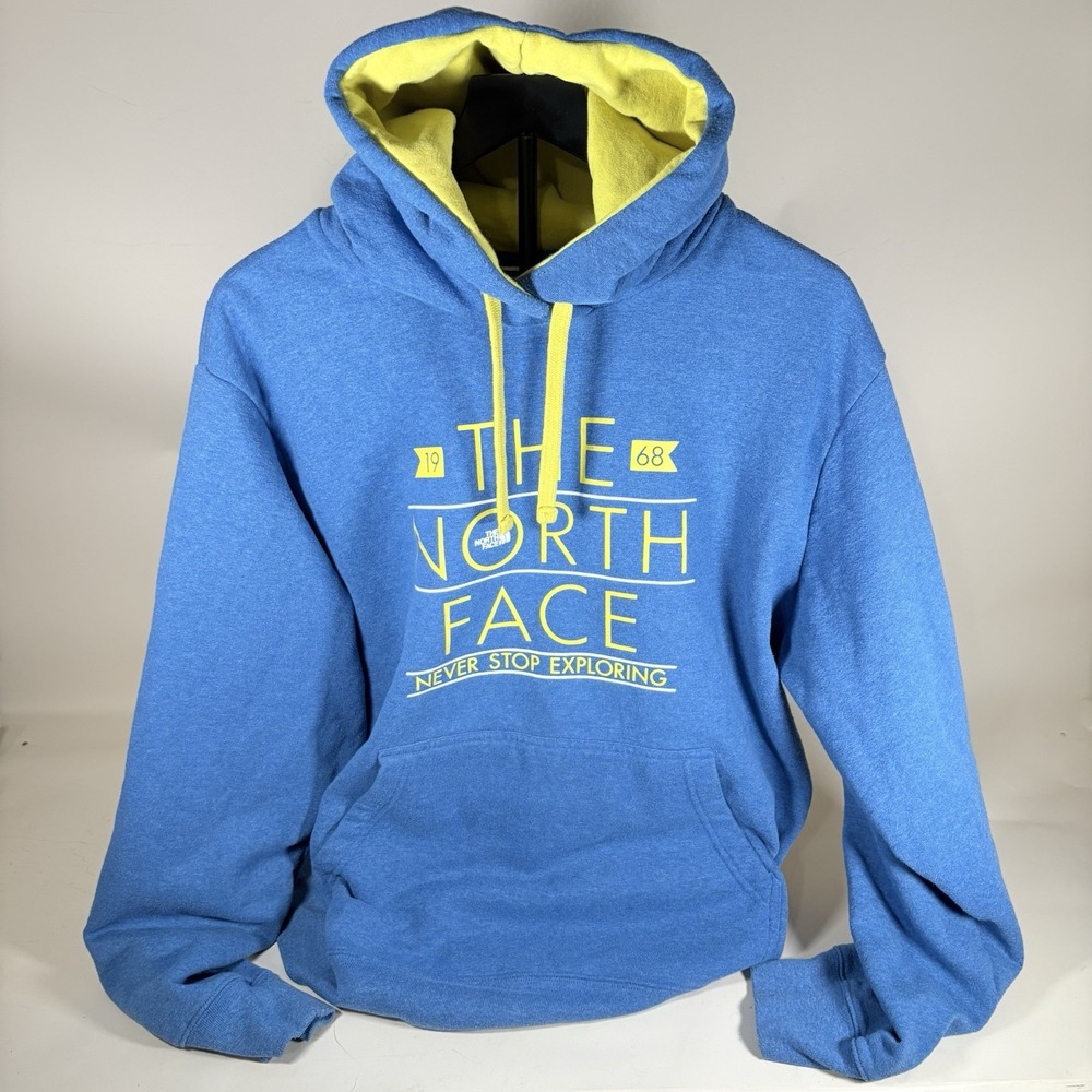 The North Face Blue Hoodie with Yellow Accents